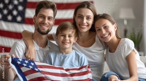 Family Holding the American Flag photo