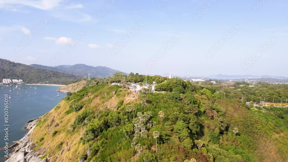 Phuket Best View Point Sunset Phrom Thep Cape Thailand evening aerial top view amazing perfect nature  hit the rock around island. green forest peaceful. green sea, landscape.