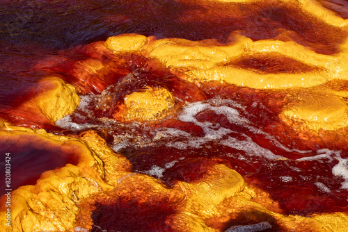 Vivid red and yellow colors of Riotinto River photo