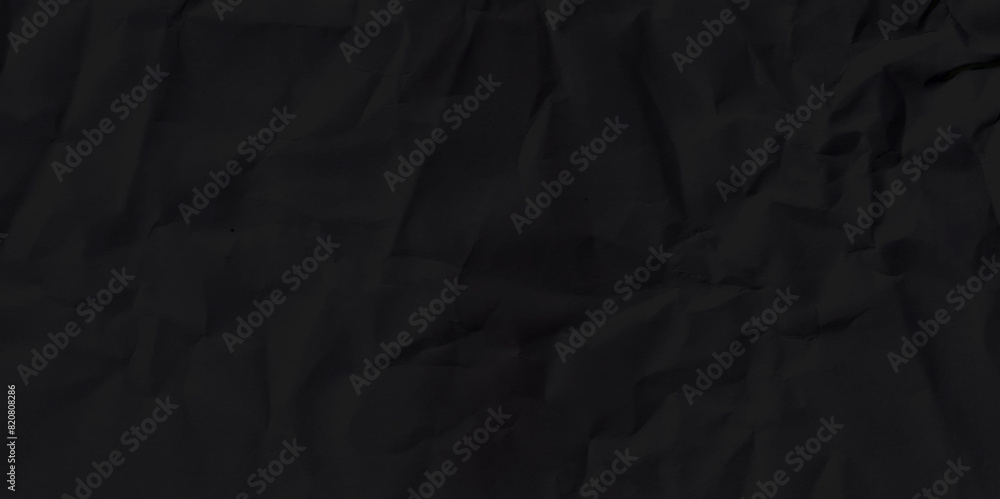 Black crumpled paper texture background. Black crumpled paper texture background.