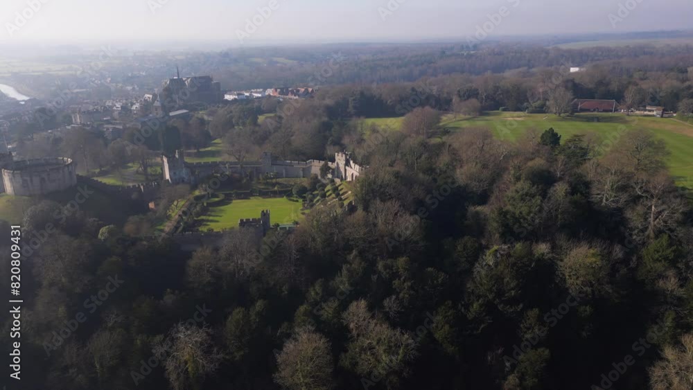 Drone view over the Arundel Castle on a foggy sunny morning in West Sussex, England Drone view over the Arundel Castle on a foggy sunny morning in West Sussex, England