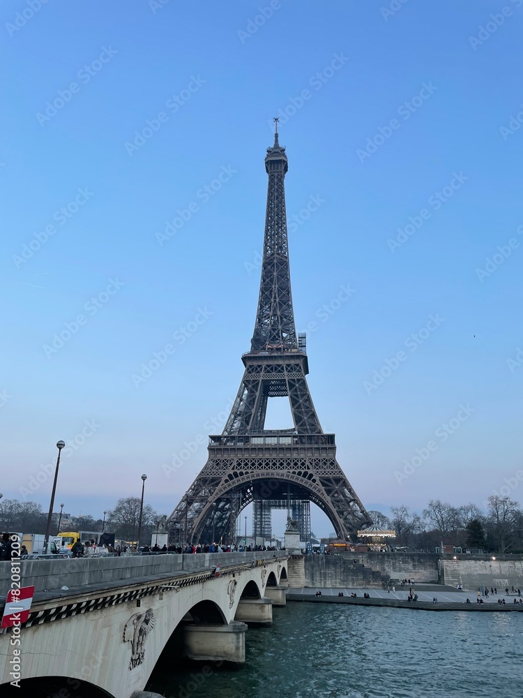 Fototapeta premium Beautiful View with the Eiffel Tower and Pont d’Iéna at Sunset in Paris, France