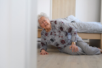 Elderly woman tripped and fell from bed, injured herself, broke her hip.