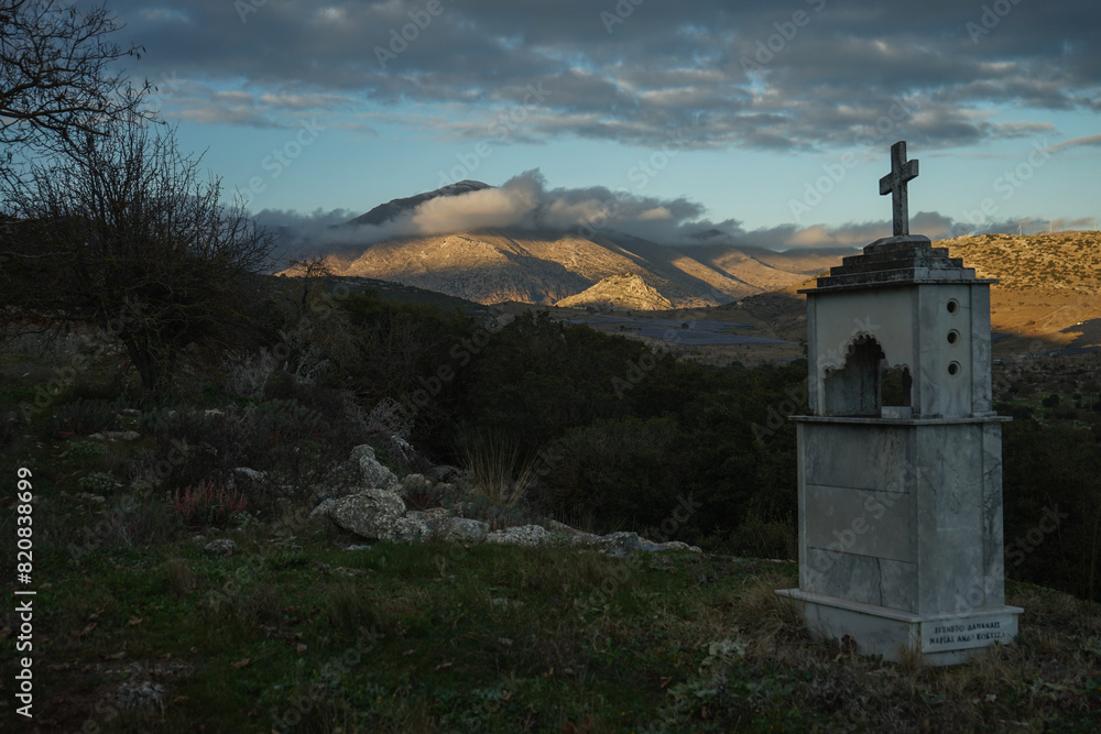 cloudy mountain and grave