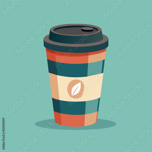 A cup of coffee with a leaf resting on top, set against a blue background