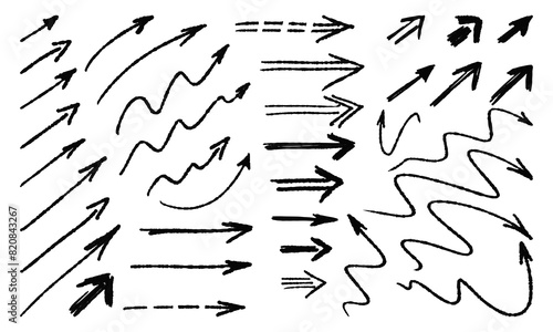 Thirty-eight handwritten arrows - straight and curved. Doodles and squiggles. Vector set