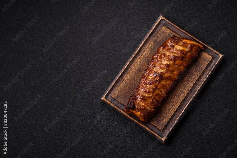 Delicious juicy grilled ribs with honey and mustard sauce Delicious juicy grilled ribs with honey and mustard sauce