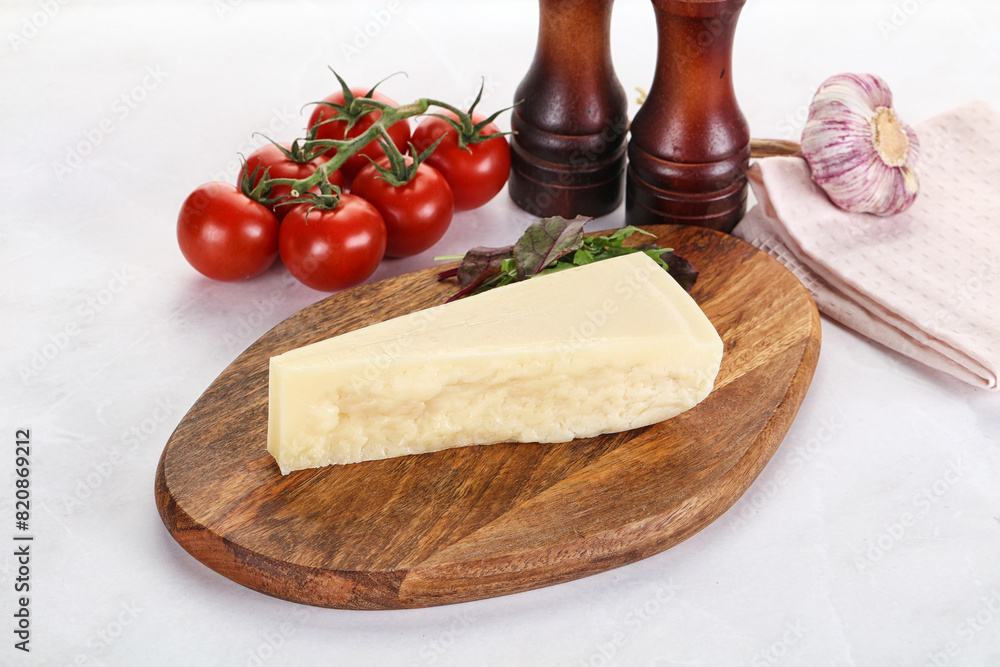 Piece Italian hard parmesan cheese Piece Italian hard parmesan cheese