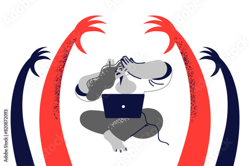 Woman victim internet bullying suffers because of trolls, sitting with laptop among hands monsters