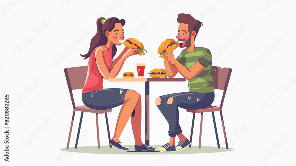 Hungry couple eat falafel in pita sit at table 