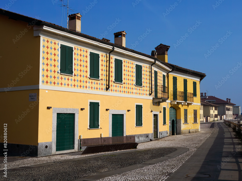 Gaggiano, Milan Italy: exterior of historic houses along the Naviglio Grande