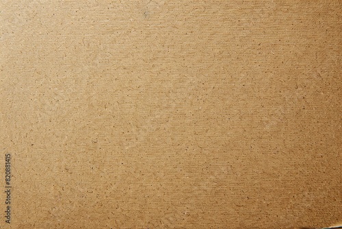Closeup of cardboard with brown and peach shades