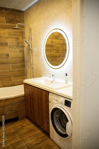 Modern Bathroom with Integrated Laundry Facilities