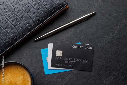 Black credit card on office table © karandaev
