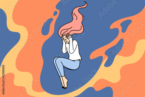 Depressed woman clutches head feeling migraine caused by stress, floating among flames. Apathetic state and frustration in depressed lady who needs help of psychotherapist to combat mental disorder