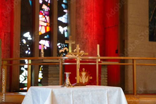 altar in church with cross and candle