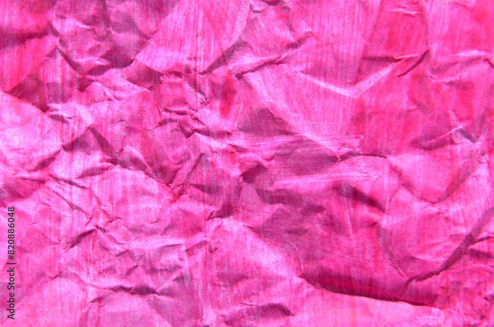 Obraz premium simple background of crumpled pink paper