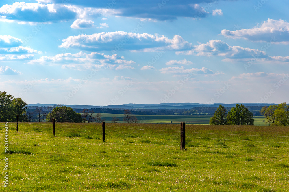 Rural landscape with field and sky.