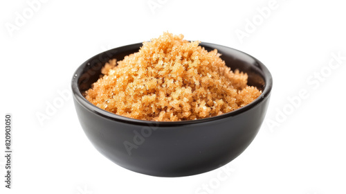 Culinary Delights: A Black Bowl Brimming With Food on a White Table