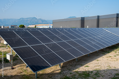 Solar photovoltaic panels in solar farm. Renewable energy, green energy, sustainable energy, electric power generation, decarbonization. Ecology and sustainability concept