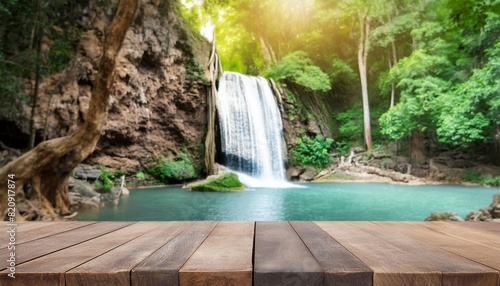wood table top podium in outdoors waterfall green lush tropical forest nature background organic healthy natural product present placement pedestal counter display website banner cover jungle concept