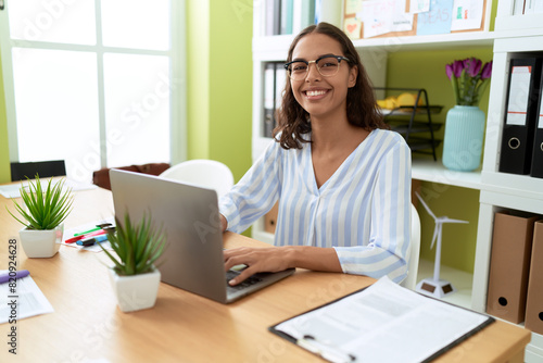 Young african american woman business worker using laptop working at office © Krakenimages.com