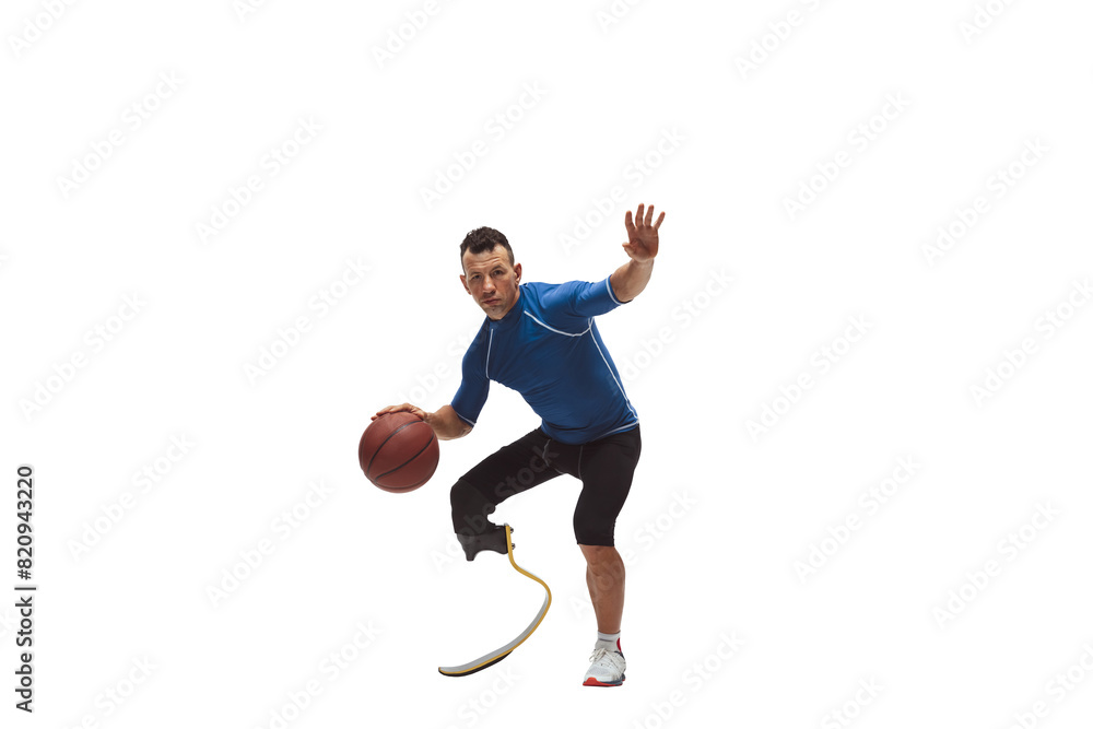 Fototapeta premium Champion of adaptability. Muscular man with prosthetic leg training basketball game, playing with confidence isolated on transparent background. Concept of inclusive sport, heath care, endurance