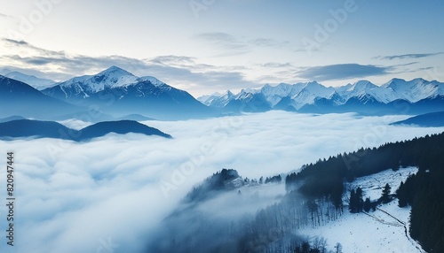 watercolor blue and white misty landscape with snowy mountains background