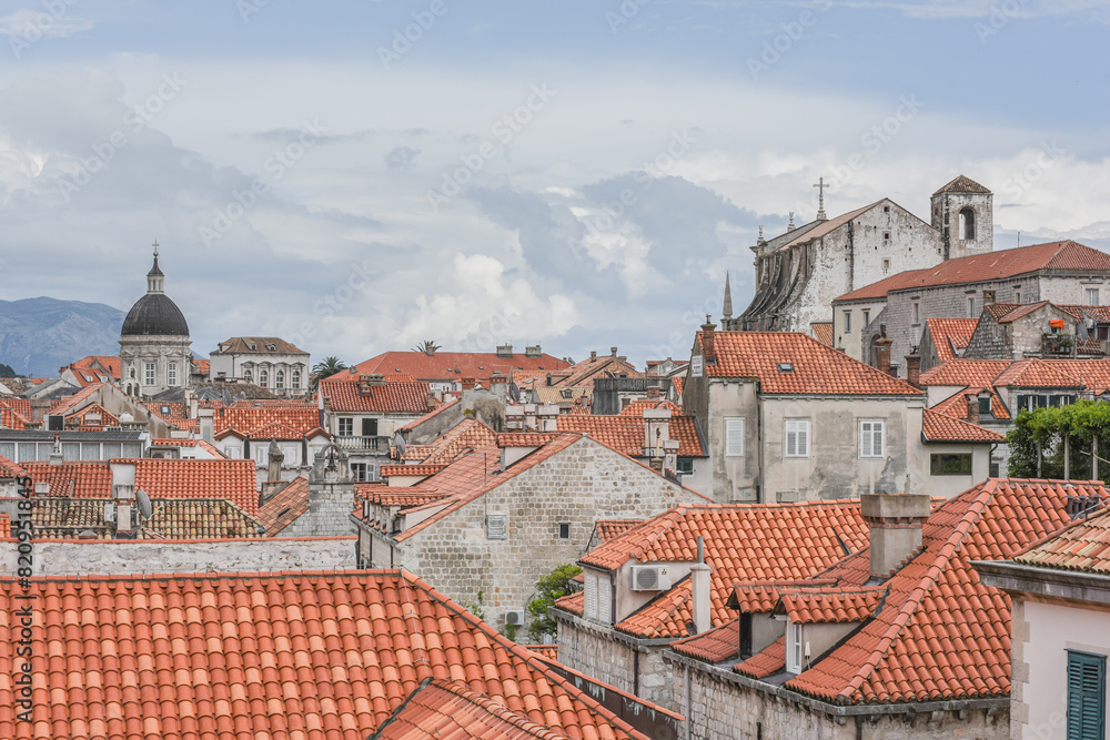 Obraz premium Landscape View Of Old Town Dubrovnik (UNESCO Cultural Heritage) With Beautiful Traditional Buildings, Squares, Churches, Harbor And Islands, Croatia
