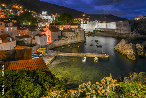 Landscape View Of Old Town Dubrovnik (UNESCO Cultural Heritage) With Beautiful Traditional Buildings, Squares, Churches, Harbor And Islands, Croatia photo