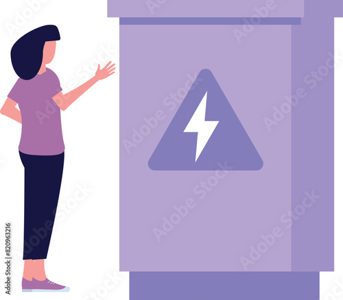 The girl is looking at the fuse box.