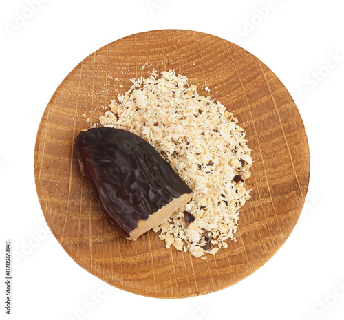 Tonka bean isolated on white background with full depth of field. Bean of Dipteryx odorata, Top view. Flat lay photo