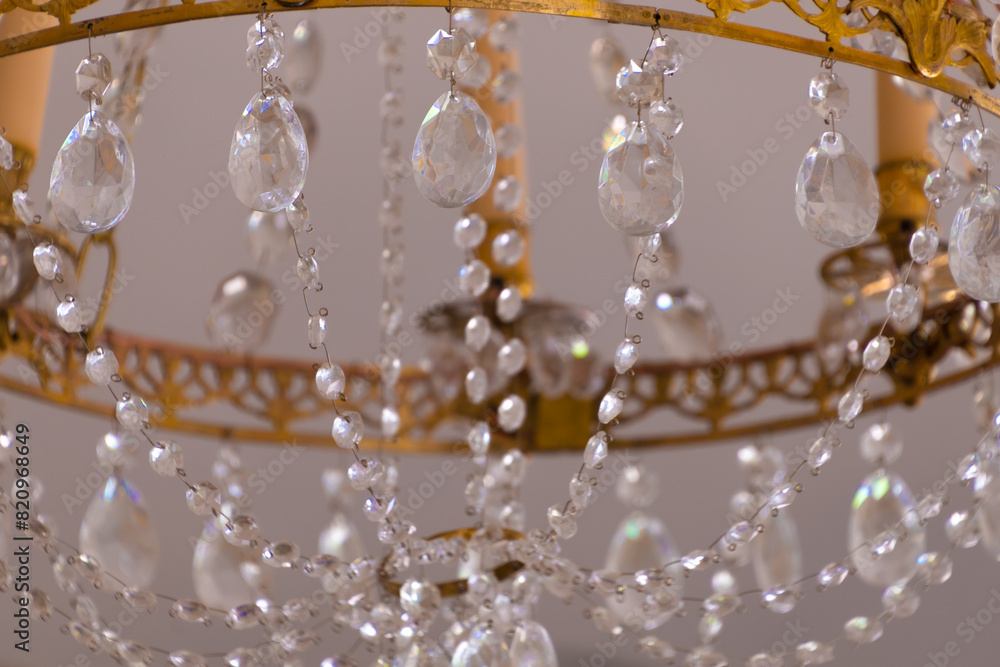 A beautiful chandelier decorated with clear crystals. A beautiful chandelier decorated with clear crystals.