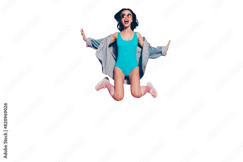 Full size photo of glad optimist carefree careless funny freedom lady with her wave curly hair she wear in trendy sun eyewear casual jeans shirt stylish shoes isolated on shine pink background Full size photo of glad optimist carefree careless funny freedom lady with her wave curly hair she wear in trendy sun eyewear casual jeans shirt stylish shoes isolated on shine pink background