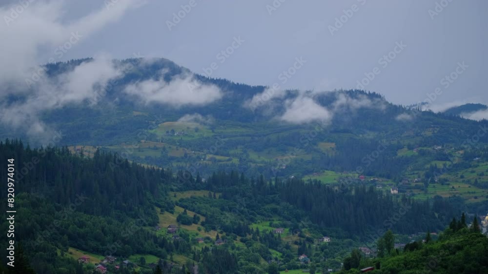Morning Clouds over the morning Carpathian village Morning Clouds over the morning Carpathian village