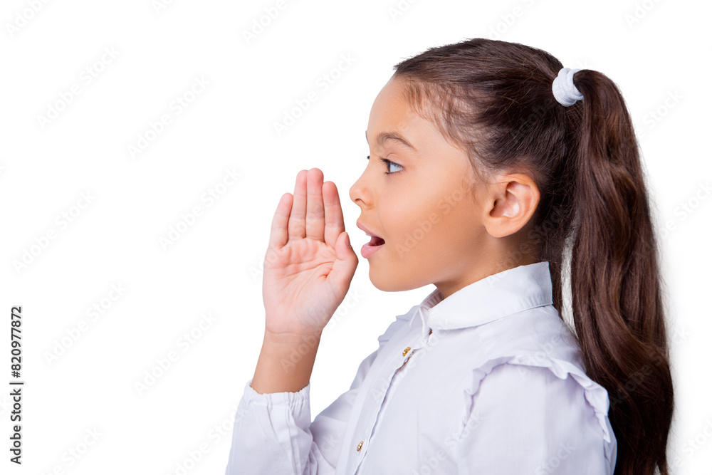 Profile side view of nice cute curious cheerful adorable lovely stylish little small girl with curly pigtails in white formal blouse shirt, announcing news Isolated over grey background Profile side view of nice cute curious cheerful adorable lovely stylish little small girl with curly pigtails in white formal blouse shirt, announcing news Isolated over grey background
