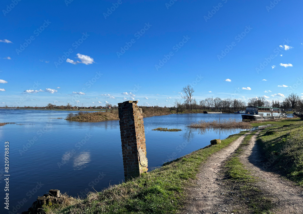 Beautiful spring landscape.
River flood. Blue sky. Reflections in the water. Beautiful spring landscape.
River flood. Blue sky. Reflections in the water.