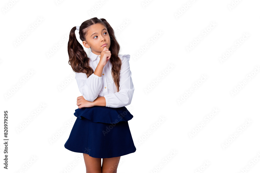 Nice cute dreamy adorable lovely stylish girl with curly pigtails in white blouse shirt and dark blue shirt skirt, thoughtful gesture, hand fist to chin, copy-space. Isolated over grey background Nice cute dreamy adorable lovely stylish girl with curly pigtails in white blouse shirt and dark blue shirt skirt, thoughtful gesture, hand fist to chin, copy-space. Isolated over grey background