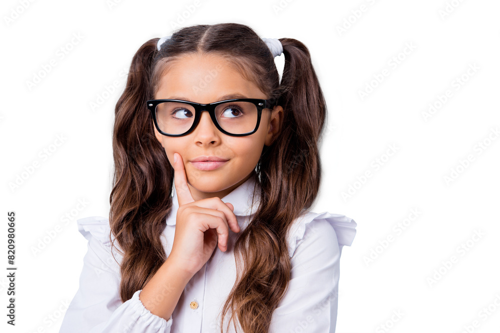 Close-up portrait of nice cute minded funny adorable lovely stylish small little girl with two curly ponytails in white formal blouse shirt, wearing glasses. Isolated over grey background Close-up portrait of nice cute minded funny adorable lovely stylish small little girl with two curly ponytails in white formal blouse shirt, wearing glasses. Isolated over grey background