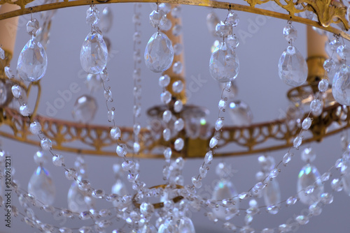 A beautiful chandelier decorated with clear crystals.