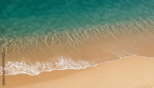 beautiful abstract sand beach from above with water and sand texture in sunshine clean and pure empty nature background with copy space for your advertising and product presentation