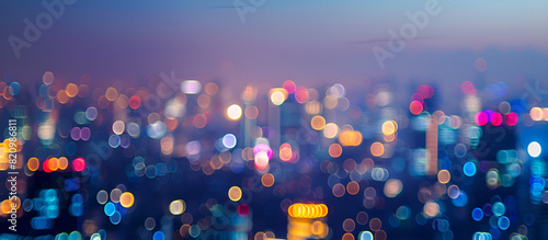 Abstract blurry background of city night light cityscape background in defocus with colorful light of city urban modern lifestyle using for travel and business concept

