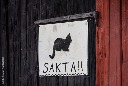 Photography Stockholm, Sweden A sign in Swedish says Slow, watch for cats.
