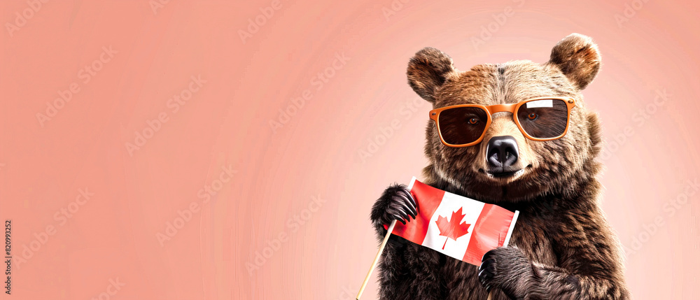 A bear wearing sunglasses and proudly holding a Canadian flag in its paw A bear wearing sunglasses and proudly holding a Canadian flag in its paw
