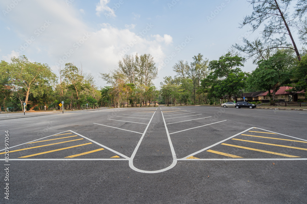 The parking lot is empty. The parking lot is empty.