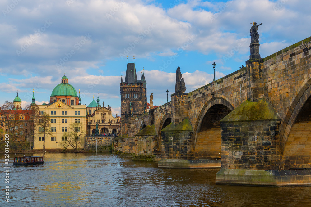 The Vltava River in the center of the Czech Republic near the Charles Bridge on a cloudy spring day