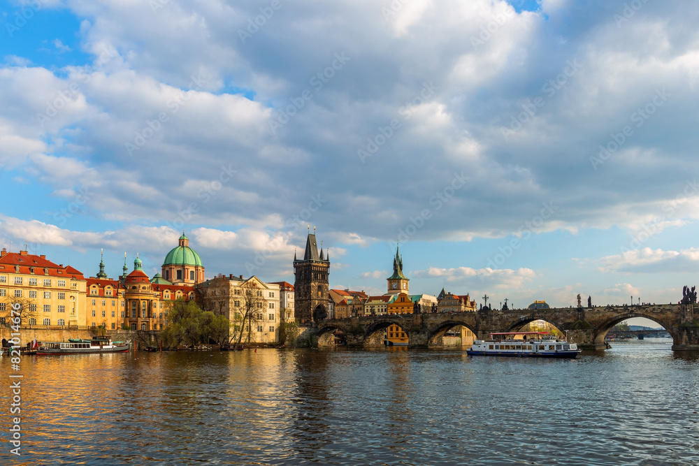 The Vltava River in the center of the Czech Republic near the Charles Bridge on a cloudy spring day The Vltava River in the center of the Czech Republic near the Charles Bridge on a cloudy spring day