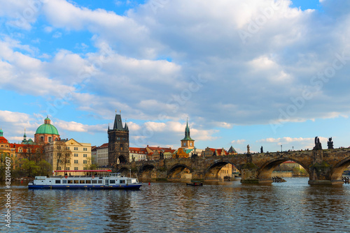 The Vltava River in the center of the Czech Republic near the Charles Bridge on a cloudy spring day © Max Zolotukhin