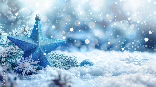 Blue Christmas star decoration with pine cones in snow.