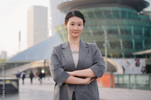 Confident Businesswoman In Modern City Environment